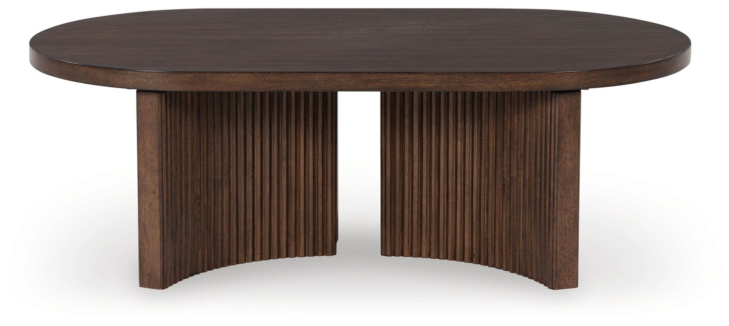 Korestone - Dark Brown - Oval Cocktail Table